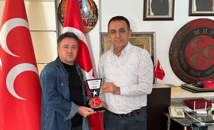 MHP’den plaketli teşekkür