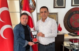 MHP’den plaketli teşekkür